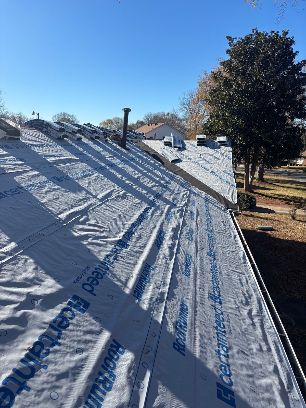 Waterproof underlayment being installed