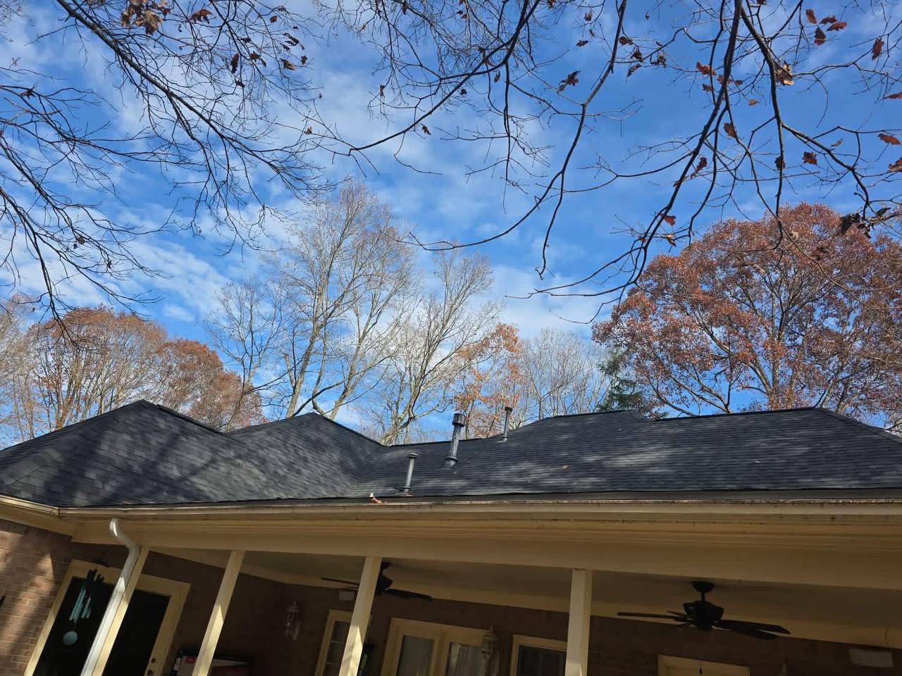 Brand-new roof installed on a home, replacement complete
